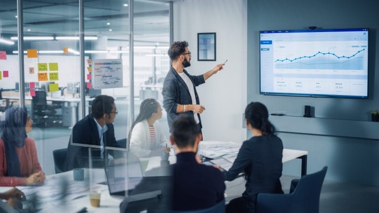 Diverse Modern Office: Motivated Businessman Leads Business Meet