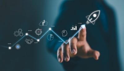 Businessman touch rocket launch investment growth, planning and starting corporate business start up aiming objective value development leadership and customer target group.